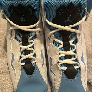 Jordan’s Kids Blue and White Sneakers